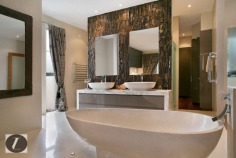 Modern contemporary elegance would best describe this stunning three-level home, perfectly positioned on the waterfront overlooking the wide open canal and out to the Broadwater. From the striking water feature in the entry, through to the incredible kitchen with backlit glass feature, this home provides the very best in indoor and outdoor luxury lifestyle. Whether you are after an impressive bar and entertaining area on the waterfront, or a huge man cave including 12 person spa, this is the house for you!

This home's features include:

-	6 bedrooms
-	5 bathrooms
-	3 powder rooms
-	10 car basement garage
-	North-to-water aspect
-	28 m* waterfrontage
-	Great floor plan with void creating abundance of light and space
-	Stone, marble and water features provide a warm ambience
-	Floor to ceiling glass bi-folds create the ultimate in seamless indoor/outdoor living
-	Sunken formal lounge with gas fireplace
-	Floor to ceiling glass creates spectacular frame for the sensational water views
-	Open plan living areas taking full advantage of the views
-	Fabulous kitchen with backlit glass feature, stone bench tops, wine fridge, Miele appliances including coffee machine
-	Stunning outdoor entertaining area with electronic shutters, stone benches, bar area, cold room, wine fridges, sink and BBQ - and a big screen TV!
-	Another open air entertaining terrace on the waterfront, next to the in ground heated lap pool with plunge pool
-	Tiered theatre with premier home theatre system, a bar and its own powder room
-	Impressive master suite on ground floor with stone feature wall above the vanities, enormous stand-alone bath
-	Master also boasts large walk-in robe with shoe and handbag display areas
-	Upstairs the 2 large waterfront bedrooms are ensuited with superb views
-	There are also 3 bedrooms built especially for the kids with built-in daybeds, which share a bathroom
-	Enviable 'man-cave' in basement, with sliding doors, plenty of room to create the perfect den for your needs
-	Just outside the den area is a 12-person spa
-	Also in basement you will find a dedicated gym room with TV and floor-to-ceiling mirrors, beauty room and bathroom
-	Schindler's lift to all levels
-	Polished timber floors upstairs
-	Floating pontoon with 15m* pontoon
-	Superb position in canal with views out to the open Broadwater
-	Fully fenced with secure gatehouse at front
-	Fully automated C-bus system
-	Reverse cycle ducted air conditioning

Located in a quiet cul-de-sac in a prestigious street surrounded by other waterfront mansions, you are in good company! The Sovereign Islands is a unique island community providing 24 hour security with patrols. Private, luxurious and secure, yet so close the cafes, restaurants, shops and parklands of Paradise Point.

Call Shaun today to arrange your private inspection.