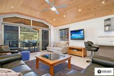  2868 River Road, Wisemans Ferry NSW For Sale - Villas From $485,000 bed 2 bath 1 car 2 Ko-veda Holiday Park Estate Ltd. is the only brand new facility of its kind in Australia, based on the American idea "Gated Facility", assuring excellent security and luxurious surroundings for its occupants. It`s an upmarket absolute waterfront resort catering only for the individual Villa owners and their families and friends. No public access whatsoever.  The Park is situated in very pristine settings on the banks of the Hawkesbury River within 1 hour pleasant drive from Sydney CBD on non-congested roads, even in peak holiday periods, and when you get there, you get the feeling you`re completely separated from the rest of the world, very protected from all the elements situated between mountain sides on both sides of the 500 metre wide River, with Pitt Water & Windsor 1 hour away in opposite directions by boat. The Park consists of 42 immaculately kept acres, 1000m water frontage with established Jetties & Pontoons. Every Villa owner has absolute water frontage within 20m to the waters edge, exclusive private beach and boat mooring directly in front. The Park is also an attractive destination for Cruiser owners. We offer year round all inclusive cruiser mooring or dry storage on land, we will actually custom build an on-site trailer for your boat up to 40` in length, a very attractive alternative for the discerning Cruiser owner to store this valuable asset on land for at least half the year may be more and only launch it for peak periods, allowing for hull maintenance, etc.. Experienced mechanics, boat builders, trimmers, etc.is also available at any given time. New Villa owners can choose their own desired interior layout, colour schemes, choice of appliances, tiles, etc.. The Villas have a double garage attached to them for the storing of Powerboats, jet skis and every conceivable gadget used for water activities of any kind. For more information visit website www.koveda.com.au or contact Travis Reeve on 0414 347 713 