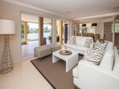 This prestigious estate is situated at the end of the highly respected Maryland Avenue. Situated in privacy behind grand electric gates and sand stone walls are two prime acres on two titles.

The architect has designed this home to maximize its North facing position with views to the East as well. This park like setting with mature trees is elevated 1.7 meters above adjoining land and has not been affected by major floods. This recently refurbished residence offers 1,000 square meters of opulent decor with the latest sinks, tubs and tap ware. Separate from the main house and situated near the entry gates is 2 bedroom guest house with its own complete kitchen, laundry, lounge and study. A large pontoon and wharf beside the river gives access to the Broadwater and out to the ocean from your back yard.

Features of this property:

7 Bedrooms, 6 bathrooms, 5 car garage with parking for upto 10 vehicles
Master bedroom includes parents retreat, twin dressing room, riverside balcony, and deluxe ensuite
Designer chefs kitchen with granite bench tops, 2 oven plus warming ovens, and walk in pantry
A Helipad has been approved for this estate.
Championship tennis court with flood lights and pavilion with kitchen, bath and shower.
10 meter pontoon, jet ski cradle, power and water supply
Infar-red security cameras with back to base alarms
Automatic emergency power generator
fully automated irrigation
Future sub- division potential - subject to council approval
Formal living area with open fireplace
Wine cellar
indoor/outdoor entertaining
In-ground swimming pool
in home theatre with elevated seating and soundproof walls
Games room
sizable laundry
Ducted air-conditioning
Landscaped gardens with mature trees and lush lawns, Horses are permitted on the property
Sweeping 200 degree river and skyline views
Less than 5 minutes drive to Royal Pines Golf Resort, Emerald lakes golf, Lakelands golf
8 min drive to Major Shopping Centres, Schools and Central Business district
This property is currently on two titles with an option to purchase the main house and guest house on 1 acre, or purchase 1 acre of riverfront land for offers over $2 million