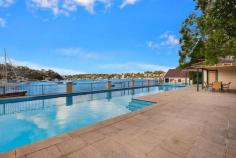  DOLANS BAY NSW 742 Port Hacking Road A truly unique prospect for first class family living, this landmark residence is set over a 2,950sqm north facing waterfront parcel embracing spectacular bay views. It magnificently fuses period charm with contemporary style and unrivalled facilities. Restored sandstone home formerly Sisters of Mercy Convent Stunning architecturally designed contemporary wing addition Palatial interiors customised with globally sourced materials Living areas utilise glass and outdoor flow to maximise views State-of-the-art CaesarStone kitchen with Miele appliances Ten person home theatre room, entertainers’ kitchen and bar 22m heated indoor pool, gym, sauna and steam room facilities 26m waterside pool set amid terraced manicured gardens All boating facilities including boatshed, sliprails, jetty Just minutes to village shops, proximate to beach, airport 