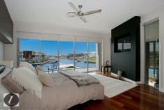 Modern contemporary elegance would best describe this stunning three-level home, perfectly positioned on the waterfront overlooking the wide open canal and out to the Broadwater. From the striking water feature in the entry, through to the incredible kitchen with backlit glass feature, this home provides the very best in indoor and outdoor luxury lifestyle. Whether you are after an impressive bar and entertaining area on the waterfront, or a huge man cave including 12 person spa, this is the house for you!

This home's features include:

-	6 bedrooms
-	5 bathrooms
-	3 powder rooms
-	10 car basement garage
-	North-to-water aspect
-	28 m* waterfrontage
-	Great floor plan with void creating abundance of light and space
-	Stone, marble and water features provide a warm ambience
-	Floor to ceiling glass bi-folds create the ultimate in seamless indoor/outdoor living
-	Sunken formal lounge with gas fireplace
-	Floor to ceiling glass creates spectacular frame for the sensational water views
-	Open plan living areas taking full advantage of the views
-	Fabulous kitchen with backlit glass feature, stone bench tops, wine fridge, Miele appliances including coffee machine
-	Stunning outdoor entertaining area with electronic shutters, stone benches, bar area, cold room, wine fridges, sink and BBQ - and a big screen TV!
-	Another open air entertaining terrace on the waterfront, next to the in ground heated lap pool with plunge pool
-	Tiered theatre with premier home theatre system, a bar and its own powder room
-	Impressive master suite on ground floor with stone feature wall above the vanities, enormous stand-alone bath
-	Master also boasts large walk-in robe with shoe and handbag display areas
-	Upstairs the 2 large waterfront bedrooms are ensuited with superb views
-	There are also 3 bedrooms built especially for the kids with built-in daybeds, which share a bathroom
-	Enviable 'man-cave' in basement, with sliding doors, plenty of room to create the perfect den for your needs
-	Just outside the den area is a 12-person spa
-	Also in basement you will find a dedicated gym room with TV and floor-to-ceiling mirrors, beauty room and bathroom
-	Schindler's lift to all levels
-	Polished timber floors upstairs
-	Floating pontoon with 15m* pontoon
-	Superb position in canal with views out to the open Broadwater
-	Fully fenced with secure gatehouse at front
-	Fully automated C-bus system
-	Reverse cycle ducted air conditioning

Located in a quiet cul-de-sac in a prestigious street surrounded by other waterfront mansions, you are in good company! The Sovereign Islands is a unique island community providing 24 hour security with patrols. Private, luxurious and secure, yet so close the cafes, restaurants, shops and parklands of Paradise Point.

Call Shaun today to arrange your private inspection.