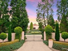 Dural NSWStory Of A Fairy Tale A beautiful blend of timeless charm and modern styling is this magnificent double bricked home set on 1.43 (approx.) desirable landscaped hectares. Every direction you turn there is something amazing to see from water features to amazing gardens to the detail of the architectural design of the home.  Upon entering the driveway through the wrought iron electric gates you will immediately feel as though you have stepped into a fairy tale! You will love the impressive grand entrance with marble floors, huge crystal chandeliers and sublimely crafted centre piece. The style and features of this property cannot be expressed purely in words. However, here is a taste of what this magnificent estate comprises of:  * Elegant formal lounge room with fireplace expanding to the sunken formal dining room  * Gourmet timber kitchen equipped with Miele appliances, granite bench-tops, dishwasher, 3 ovens, microwave and an island bench with a selection of cooking elements  * Huge walk-in pantry leading to the cool room  * Meals area off kitchen  * Family room with fireplace  * Casino dubbed room off family room  * Ballroom with bar, stage, commercial grade kitchen fit for a chef plus a billiard room - Perfect to host your own Great Gatsby party!  * Additional lounge room with pitched wooden panel ceiling, sink and French doors opening to the yard  * Master bedroom with walk-in robe, ensuite and it's own courtyard  * Ensuite to the other 4 bedrooms in the main house  * Resort style bathroom with spa, dual sink, shower and toilet room  * Guest wash closets  * Cancel your gym membership as it includes a gymnasium room and sauna  * Extra living room with laundry tub to the right wing  * The guest house features a lounge & dining room, kitchen with dishwasher, 2 bedrooms and bathroom with separate toilet  * 2 entertainment areas overlooking the pool and BBQ area  * Alluring salt water inground pool with spa, waterfall and it's own island surrounded by palm trees and plants  * Hold your own grand slam with this full size tennis court  * Lots of grass area - perfect for playing croquet or equestrian  * 22x12m shed/mechanic workshop with stable  * 6-car automatic garage  Additional features include: imported Italian wallpaper, ducted air conditioning throughout, alarm system, intercom, security camera system, detailed cornices, high ceilings, feature skylights, French doors & windows, huge laundry, study room, 35,000L underground water tank, septic tank, timers to the external lights and fountains.  Turn your dream into a reality!  For a full list of inclusions and to arrange a private inspection, call Ruma Mundi today on 0411 030 202 or 02 8883 1088. 