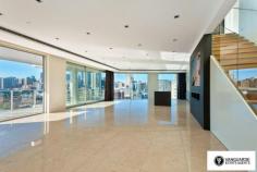 Unit 1501/507 Wattle Street,  Sydney NSW For Sale - $3,300,000  3  4  4 For the first time offered since completion, Vanguarde is happy to present to you this spectacular brand new three bedroom penthouse, which is ideal for the modern family or foreign purchaser. Commanding the top 2 levels, this impressive residence offers a huge roof top terrace with uninterrupted 180 degree north, views of Sydney. Spanning from the west right around to the east, this aspect incorporates stunning city skyline and Anzac Bridge views. Accommodation comprises of 3 generous bedrooms, all with full ensuites including spa bath, and built in robes. This residence offers a total of 545sqm on title. The huge rooftop terrace includes a full outdoor kitchen with BBQ plus a complete guest bathroom. With direct lift access from the ground, making it perfect for entertaining guests! Features include only the highest quality finishes throughout, including marble stone and Australian hardwood timber flooring, LED lights and double glazed floor to ceiling glass, allowing you to take in the expansive views. The designer kitchen comes complete with White Caesar stone bench tops, stainless steel Smeg appliances including built in coffee machine and plate warmer, soft close drawers and a built in double door fridge. The residence provides ducted reverse cycle air-conditioning, spacious 4 car lock up garage with direct lift access plus extra storage, an internal laundry and a self controlled video security system.  With the lowest strata levies in Sydney for a property of this size, and the possibility to extend space and add value, the opportunities in purchasing this property are endless.  This is truly a unique property and is must see for anyone looking at purchasing their perfect city home! Quarterly Rates Strata: $805 per quarter approx Water: $168 per quarter approx Council: $225 per quarter approx For more information contact Travis Reeve on 0414 347 713 or travis@vanguarde.com.au or Darren Smith on 0412 418 415 