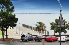 Apartment 101 at the award winning Pier Point complex is a spacious 2 plus study apartment which enjoys the beautiful views of Corio bay and the Geelong waterfront right from the comfort of your own living/dining area. Exceptional quality throughout, Pier Point offers some of the best waterfront living opportunities in Victoria with north facing water views and connected to the ever growing Geelong CBD, everything is at your doorstep. It’s a simple lifestyle, without the pressures of maintenance to worry about. Spend more time with family and friends, go for a stroll down the esplanade, take a dip in the bay or go away on extended holidays with a stronger sense of security. This is what apartment living is all about.With the offering of great space throughout, the open plan living/dining area leads onto a great size balcony with picturesque views toward the east, you’ll enjoy the morning sun shining through. The kitchen is complimented with Miele appliances and offers great bench space and storage. The Master bedroom has a large WIR and ensuite and is set back to the rear of the apartment keeping things quiet and private for those seeking a little alone time. A further second bedroom with BIRs and study area with storage completes the internal areas of this apartment. 1 secure carspace is allocated to the apartment and is conveniently located directly off Cunningham Street.