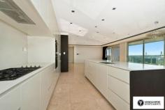 Unit 1501/507 Wattle Street,  Sydney NSW For Sale - $3,300,000  3  4  4 For the first time offered since completion, Vanguarde is happy to present to you this spectacular brand new three bedroom penthouse, which is ideal for the modern family or foreign purchaser. Commanding the top 2 levels, this impressive residence offers a huge roof top terrace with uninterrupted 180 degree north, views of Sydney. Spanning from the west right around to the east, this aspect incorporates stunning city skyline and Anzac Bridge views. Accommodation comprises of 3 generous bedrooms, all with full ensuites including spa bath, and built in robes. This residence offers a total of 545sqm on title. The huge rooftop terrace includes a full outdoor kitchen with BBQ plus a complete guest bathroom. With direct lift access from the ground, making it perfect for entertaining guests! Features include only the highest quality finishes throughout, including marble stone and Australian hardwood timber flooring, LED lights and double glazed floor to ceiling glass, allowing you to take in the expansive views. The designer kitchen comes complete with White Caesar stone bench tops, stainless steel Smeg appliances including built in coffee machine and plate warmer, soft close drawers and a built in double door fridge. The residence provides ducted reverse cycle air-conditioning, spacious 4 car lock up garage with direct lift access plus extra storage, an internal laundry and a self controlled video security system.  With the lowest strata levies in Sydney for a property of this size, and the possibility to extend space and add value, the opportunities in purchasing this property are endless.  This is truly a unique property and is must see for anyone looking at purchasing their perfect city home! Quarterly Rates Strata: $805 per quarter approx Water: $168 per quarter approx Council: $225 per quarter approx For more information contact Travis Reeve on 0414 347 713 or travis@vanguarde.com.au or Darren Smith on 0412 418 415 