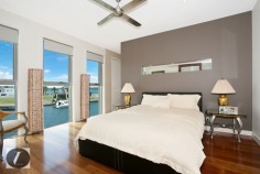 Modern contemporary elegance would best describe this stunning three-level home, perfectly positioned on the waterfront overlooking the wide open canal and out to the Broadwater. From the striking water feature in the entry, through to the incredible kitchen with backlit glass feature, this home provides the very best in indoor and outdoor luxury lifestyle. Whether you are after an impressive bar and entertaining area on the waterfront, or a huge man cave including 12 person spa, this is the house for you!

This home's features include:

-	6 bedrooms
-	5 bathrooms
-	3 powder rooms
-	10 car basement garage
-	North-to-water aspect
-	28 m* waterfrontage
-	Great floor plan with void creating abundance of light and space
-	Stone, marble and water features provide a warm ambience
-	Floor to ceiling glass bi-folds create the ultimate in seamless indoor/outdoor living
-	Sunken formal lounge with gas fireplace
-	Floor to ceiling glass creates spectacular frame for the sensational water views
-	Open plan living areas taking full advantage of the views
-	Fabulous kitchen with backlit glass feature, stone bench tops, wine fridge, Miele appliances including coffee machine
-	Stunning outdoor entertaining area with electronic shutters, stone benches, bar area, cold room, wine fridges, sink and BBQ - and a big screen TV!
-	Another open air entertaining terrace on the waterfront, next to the in ground heated lap pool with plunge pool
-	Tiered theatre with premier home theatre system, a bar and its own powder room
-	Impressive master suite on ground floor with stone feature wall above the vanities, enormous stand-alone bath
-	Master also boasts large walk-in robe with shoe and handbag display areas
-	Upstairs the 2 large waterfront bedrooms are ensuited with superb views
-	There are also 3 bedrooms built especially for the kids with built-in daybeds, which share a bathroom
-	Enviable 'man-cave' in basement, with sliding doors, plenty of room to create the perfect den for your needs
-	Just outside the den area is a 12-person spa
-	Also in basement you will find a dedicated gym room with TV and floor-to-ceiling mirrors, beauty room and bathroom
-	Schindler's lift to all levels
-	Polished timber floors upstairs
-	Floating pontoon with 15m* pontoon
-	Superb position in canal with views out to the open Broadwater
-	Fully fenced with secure gatehouse at front
-	Fully automated C-bus system
-	Reverse cycle ducted air conditioning

Located in a quiet cul-de-sac in a prestigious street surrounded by other waterfront mansions, you are in good company! The Sovereign Islands is a unique island community providing 24 hour security with patrols. Private, luxurious and secure, yet so close the cafes, restaurants, shops and parklands of Paradise Point.

Call Shaun today to arrange your private inspection.