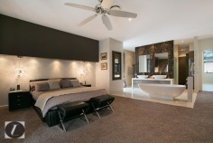 Modern contemporary elegance would best describe this stunning three-level home, perfectly positioned on the waterfront overlooking the wide open canal and out to the Broadwater. From the striking water feature in the entry, through to the incredible kitchen with backlit glass feature, this home provides the very best in indoor and outdoor luxury lifestyle. Whether you are after an impressive bar and entertaining area on the waterfront, or a huge man cave including 12 person spa, this is the house for you!

This home's features include:

-	6 bedrooms
-	5 bathrooms
-	3 powder rooms
-	10 car basement garage
-	North-to-water aspect
-	28 m* waterfrontage
-	Great floor plan with void creating abundance of light and space
-	Stone, marble and water features provide a warm ambience
-	Floor to ceiling glass bi-folds create the ultimate in seamless indoor/outdoor living
-	Sunken formal lounge with gas fireplace
-	Floor to ceiling glass creates spectacular frame for the sensational water views
-	Open plan living areas taking full advantage of the views
-	Fabulous kitchen with backlit glass feature, stone bench tops, wine fridge, Miele appliances including coffee machine
-	Stunning outdoor entertaining area with electronic shutters, stone benches, bar area, cold room, wine fridges, sink and BBQ - and a big screen TV!
-	Another open air entertaining terrace on the waterfront, next to the in ground heated lap pool with plunge pool
-	Tiered theatre with premier home theatre system, a bar and its own powder room
-	Impressive master suite on ground floor with stone feature wall above the vanities, enormous stand-alone bath
-	Master also boasts large walk-in robe with shoe and handbag display areas
-	Upstairs the 2 large waterfront bedrooms are ensuited with superb views
-	There are also 3 bedrooms built especially for the kids with built-in daybeds, which share a bathroom
-	Enviable 'man-cave' in basement, with sliding doors, plenty of room to create the perfect den for your needs
-	Just outside the den area is a 12-person spa
-	Also in basement you will find a dedicated gym room with TV and floor-to-ceiling mirrors, beauty room and bathroom
-	Schindler's lift to all levels
-	Polished timber floors upstairs
-	Floating pontoon with 15m* pontoon
-	Superb position in canal with views out to the open Broadwater
-	Fully fenced with secure gatehouse at front
-	Fully automated C-bus system
-	Reverse cycle ducted air conditioning

Located in a quiet cul-de-sac in a prestigious street surrounded by other waterfront mansions, you are in good company! The Sovereign Islands is a unique island community providing 24 hour security with patrols. Private, luxurious and secure, yet so close the cafes, restaurants, shops and parklands of Paradise Point.

Call Shaun today to arrange your private inspection.