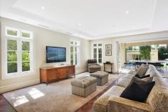  Magnificent European-inspired residence 81 Balfour Road , BELLEVUE HILL Auction Reminiscent of a classically inspired European estate, this impressive residence showcases grand proportions, meticulously selected finishes and a seamless transition between the indoors and the breathtaking alfresco areas. Completed in 2007, it's set on a level 802 sqm parcel of land in one of the East's premier blue ribbon enclaves, just a brief walk to the Rose Bay waterfront. The two-storey home contains five bedrooms and 4.5 bathrooms, including a lavish master suite with a travertine ensuite, custom-designed dressing room and a Juliet balcony. Both the elegant formal lounge and dining room and stately office are warmed by gas fires. Encompassing a sleek CaesarStone Miele kitchen, the casual entertaining space opens to an expansive terrace complete with an in-built barbeque and automated awnings. It overlooks impeccably manicured gardens with sculpted hedges, towering palm trees, a gas-heated heated pool, putting green and a poolside cabana/gym with a WC and fridges. 
