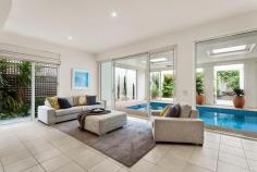 HAMPTON 28 Beach Road
EmailFacebookTwitterGoogle +Print this pageAdd to Favourite/BookmarkShare this site
Private Sale Contact Agent
4 B 3 b 4 C Watch property video
Unparalleled Resort Style Living on the Bay!
Enjoy a luxury beachside lifestyle with show-stopping bay views and timeless Jon Friedrich design with a focus on exceptional indoor/outdoor entertaining. Inspired by Noosa's Seahaven Resort this prestigious 3 bedroom, 3.5 bathroom residence boasts spectacular uninterrupted views stretching from Sandringham Yacht Club to Green point & beyond combined with sparkling internal pool views downstairs. Immaculately presented for family enjoyment featuring grand proportions and three flexible living zones including a ground floor kids haven or guest quarters with two double bedrooms both with mirrored robes & sleek granite vanity ensuites and a fully fitted study that provides a fourth bedroom option. Choose a dip in the Bay via direct access to one of Melbourne's best beaches or luxuriate by the tranquil indoor resort style lap pool encased in huge glass windows with sliding doors to a vast family lounge & bar on one side and a landscaped, paved outdoor area on the other. Panoramic views dominate the upstairs open plan living & dining area with an epicurean kitchen (granite bench tops & walk in pantry) and a sublime full-length outdoor terrace perfect for sunset entertaining. An elegant parents lounge with study alcove & a rear sun soaked deck (built in BBQ) precedes a lavish master suite with 'his & hers' dressing room and a grand Travertine spa ensuite. Meticulous attention to detail, superior finishes and luxury extras such as custom cabinetry throughout, a poolside shower, zoned heating/A/C, ducted vacuuming, alarm and a unique circular driveway with two internal access double garages (4 cars) only moments to Hampton Street shopping, dining & the station complete this idyllic family residence. For more information about this unsurpassed lifestyle property please contact Andrew Campbell.