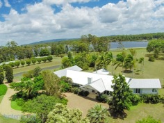 Bimbadeen means place of waterbirds - a waterfront acres sanctuary with 300 degree lake views, fishing, boating, sailing, flying??? Frontage to beautiful Lake Macdonald overlooking Noosa's botanical gardens. Private driveway is boarded by water on either side, with exotic wildlife and magnificent views to Mt Cooroy & Tinbeerwah. The perfect combination of being only 5 minutes from Cooroy and 15 minutes to Noosa, with town water, sewer and peace and tranquility. Sprawling brick residence with raked ceilings, french oak floors, gourmet kitchen, gas & induction cooking and ducted air conditioning. Solid timber doors & windows throughout. 3 separate living areas, wide entertaining patios, 4 car garage and boat store/cellar under the home.
500m Bitumen airstrip, fully insulated 2 plane hangar with workshop, separate machinery shed and van port.
Stroll the park like acreage on this resort style sanctuary tailored for relaxation. Host a tennis party on your own flood lit tennis court. This property is your opportunity to live the dream, own or operate an aircraft, also ideal for car or boat enthusiast with 2 large quality sheds and 3 phase power.18.29 acres/7.4 hectares. For further details or inspection please contact our office. rh06506

Bimbadeen - 18.29 acressealed airstrip2km Lake Frontplane hangar and shedstotally private