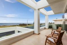 HAMPTON 28 Beach Road
EmailFacebookTwitterGoogle +Print this pageAdd to Favourite/BookmarkShare this site
Private Sale Contact Agent
4 B 3 b 4 C Watch property video
Unparalleled Resort Style Living on the Bay!
Enjoy a luxury beachside lifestyle with show-stopping bay views and timeless Jon Friedrich design with a focus on exceptional indoor/outdoor entertaining. Inspired by Noosa's Seahaven Resort this prestigious 3 bedroom, 3.5 bathroom residence boasts spectacular uninterrupted views stretching from Sandringham Yacht Club to Green point & beyond combined with sparkling internal pool views downstairs. Immaculately presented for family enjoyment featuring grand proportions and three flexible living zones including a ground floor kids haven or guest quarters with two double bedrooms both with mirrored robes & sleek granite vanity ensuites and a fully fitted study that provides a fourth bedroom option. Choose a dip in the Bay via direct access to one of Melbourne's best beaches or luxuriate by the tranquil indoor resort style lap pool encased in huge glass windows with sliding doors to a vast family lounge & bar on one side and a landscaped, paved outdoor area on the other. Panoramic views dominate the upstairs open plan living & dining area with an epicurean kitchen (granite bench tops & walk in pantry) and a sublime full-length outdoor terrace perfect for sunset entertaining. An elegant parents lounge with study alcove & a rear sun soaked deck (built in BBQ) precedes a lavish master suite with 'his & hers' dressing room and a grand Travertine spa ensuite. Meticulous attention to detail, superior finishes and luxury extras such as custom cabinetry throughout, a poolside shower, zoned heating/A/C, ducted vacuuming, alarm and a unique circular driveway with two internal access double garages (4 cars) only moments to Hampton Street shopping, dining & the station complete this idyllic family residence. For more information about this unsurpassed lifestyle property please contact Andrew Campbell.