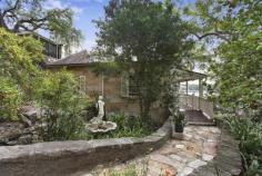  18 Ferdinand Street, Hunters Hill NSW Superb Sandstone Residence Commissioned by Henry Brooks, and built by the Joubert brothers from local sandstone in 1852, "Walshale" is a rare and superb example of Hunters Hill peninsula of yesteryear. Fronting Ferdinand Street Reserve this exquisite property enjoys private northerly views across the Lane Cove River to Linley Point, St Ignatius College and Burns Bay. The home retains exposed internal and external sandstone walls, original ornate ceilings and established gardens that are a major feature of the home with winding sandstone paths and secluded sanctuaries nestled amongst the trees.  The main hallway exudes natural light from the atrium skylights and leads you to the northern end of the home where a large formal lounge and dining room with two fireplaces and French doors open onto a polished timber verandah where the views and ambience are at their finest.  The addition of a master wing with a large bedroom, walk in wardrobe, ensuite and a separate nursery/retreat was carried out in the 1990's and compliments the character of the home. In addition there are 2 bedrooms on the upper level that share a large main bathroom with spa bath and a separate powder room is perfect for visiting guests. Downstairs there is a large open plan living and dining room with working fireplace adjoining a well equipped kitchen with separate pantry. A study/fourth bedroom enjoys its own entrance and French doors again open to a sandstone paved entertainment patio which blends seamlessly into the solar heated swimming pool and upper level lawn area. The expansive lower lawn area has a lockable shed for all of your gardening equipment and gate access to the reserve for launching your kayak and use of a shared council boat shed. A lock up garage accommodates two cars plus work bench and there is additional carport parking for two cars. A large store room or home office is conveniently positioned underneath the garage.  "Walshale" really is a unique property that needs to be seen to be appreciated so be sure not to miss your first opportunity in nearly twenty years to acquire this truly special sandstone home of local significance. 