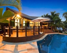 'Sails' is a significant offering of architectural brilliance and grandeur spanning three levels. Distinctly world class, positioned on 5,371sqm with a rare 176 metre wide water frontage, it is set in the prestigious Hope Island Resort.
Approximately 2,709sqm all-occasion living and entertaining
5,371sqm of north facing riverfront land, with private pontoon
Eclectic mix of classic styling and contemporary chic
Swarovski Crystal chandeliers, breathtaking views to the river
Two grand master suites, one encompassing entire upper wing
Five master sized bedrooms with ensuites and walk-in-robes
Superb commercial grade kitchen, office wing with boardroom
Library with fireplace, bar, cinema and a billiards room
Lagoon style pool, wet bar, indoor spa, sauna, barbecue area
Lift, garage for 8 cars, C-Bus, 24 hour security, F.I.R.B approved
