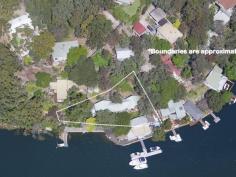 2 Anderson Place, Cottage Point NSW ottage Point Inn Restaurant & Apartments - Freehold For Sale Set in a location without comparison, is this famous waterfront restaurant/landmark - an institution amongst knowledgeable diners across Sydney and the world for over 30 years. This is an exceptional opportunity for an investor or entrepreneur to purchase one of the Hawkesbury's most exciting waterfront estates in a key location only 50 minutes from the CBD. The Cottage Point Inn Restaurant, set on the water at the junction of Cowan Waters and Coal & Candle Creek, was originally the Cottage Point boatshed and general store. The building was converted to a restaurant in the 1970s and has been operating since. Set directly behind the restaurant are two separate, fully self-contained apartments or cottages, which are included in the restaurant lease. Features include: - 5+5 year lease signed in 2012 by the tenant for restaurant and apartments - Income of $308,885.42 per annum (inclusive of GST) - Rent is indexed at CPI annually - Tenant pays 100% of outgoings (as defined in the lease agreement) - Tenant has over 30 years history of ownership and management of the restaurant and apartments - Improvements on the title include the Cottage Point Inn Restaurant building with substantial waterfront terraces, commercial kitchen, inside dining, air conditioning & his and her's bathroom - Substantial and wide waterfrontage - Floating deepwater pontoon for seaplanes and large boats - Office or flat above the restaurant with two rooms and bathroom - Two apartments set behind the restaurant - Both apartments have wide 180 degree views of magnificent Cowan Waters and Ku-ring-gai Chase National Park - Cottage one "Cowan Waters Apartment" is a self-contained apartment with full kitchen facilities, large dining and lounge area, private balcony, separate double bedroom, spa bath and reverse cycle air-conditioning - Cottage two "Riverview Suite" is equipped with breakfast bar, private balcony, lounge area, well-appointed bathroom & reverse cycle air-conditioning - License agreement (sub leased to the restaurant tenant) with National Parks and Wildlife services for the use of the land that sits over the high water mark - Access to the restaurant is by road, boat, ferry or seaplane   Property Snapshot   