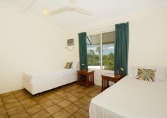 15/17 GERANIUM STREET, THE GARDENS NT

Close to Schools
Close to Shops
Close to Transport
Secure Parking
Separate Dining

This tranquil property overlooks the stunning Botanical Gardens and boasts ocean views over the treetops below and is only located minutes from the bustling Darwin CBD. 

For an unbeatable view and an inner city location without the stress - you can't go past this treetop sanctuary. 

- Gorgeous top floor apartment with botanical garden and ocean views 
- Fresh sea breeze floods through the apartment keeping it cool year round 
- Immaculately presented and perfectly maintained
- Open plan indoor / outdoor living and separate dining room 
- Tiled flooring and air-conditioning throughout
- Centralised kitchen with breakfast bar, wrap around counters and overhead storage 
- Two large bedrooms with BIR's, large windows and air-conditioning
- Spacious bathroom incorporates laundry facilities, separate toilet 
- Rear facing balcony makes over the Botanical Gardens, amazing view
- Tropical well maintained complex with two lagoon style swimming pools 
- Immaculate complex facilities and ample spare parking 
- Minutes to the CBD, Mindil Beach Markets, East Point Reserve
- Ideal for the city worker or savvy investor as a great holiday rental unit

Sitting on the top floor of a well maintained complex that features not one, but two, lagoon style swimming pools surrounded by lush tropical gardens PLUS communal facilities like a BBQ area and washrooms - as an investor or a city worker, this is a little slice of paradise minutes from local amenities and Darwin attractions.

An open plan living room greets and draws you through to the rear facing balcony boasting those impressive treetop and ocean views. Open the twin sliding doors up to capture the sea breeze and sunsets and enjoy the serenity. Tiled flooring and air-conditioning throughout create and easy maintenance lifestyle as well. 

Functional kitchen space with wrap around counters, over head storage plus breakfast bar and easy access to the dining room and the balcony if you are entertaining. 

Each of the two bedrooms is oversized with built in robes, air-conditioning and tiled flooring plus large sliding windows that when opened up capture the sea breezes and natural light.

The bathroom is spacious and well designed to incorporate the laundry facilities as well, with separate for added convenience. 

Minutes from the CBD, you can walk to the Mindil Beach Markets through the Botanical Gardens, to the Amphitheatre, or Darwin foreshore. 

Council Rates: $1,084 per annum (approx.)
Area Under Title: 112sqm
Zoning: HR (High Density)
Year Built: 1993
Vacant Possession
