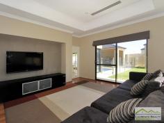  6 Lautoka Rise, Mindarie WA Beaumonde homes have been built on reputation since 1986 and this stunning 2008 built home is a classic example of the style, quality of craftsmanship and attention to detail that Beaumonde demand.  The owners of this gorgeous home insisted on important facets of the build to ensure their home exuded sophistication and quality like 38 and 37 course ceilings, imported Italian porcelain tiles, pewter granite, Eastern Blackbutt flooring from Grandwood floors and Daiken Reverse Cycle Ducted Air conditioning.  Not only is this home a stunning/quality built property but it is located in a very desirable position only minutes walk to the Mindarie Marina, Claytons beach the schools and shops. Gorgeous ocean views greet you as soon as you walk upstairs with the bright blue sparkle of the pool below.  This home is faultless, see the list of features below:  Level One:  Inviting generous decked porch area with double door entry  Classic beautiful lobby bringing you into the formal lounge  Formal Lounge the perfect place to great your guests  Double Doors lead to the open Family/Dining/Kitchen-the most important and most used area of the home with recess area to family room for the TV, a bank of glass surrounding the dining area.  Huge kitchen with Pewter granite bench tops that have shark nosed edging, massive walk in pantry, central island work area giving you uninterrupted views of the swimming pool, quality under bench oven and gas hot plate with overhead stainless steel and glass range hood. Appliance cupboard and good sized fridge recess plus plenty of preparation area  Leading from the hub of the home you enter the purpose built Theatre Room with dual access to the outdoors so can be a multi-purpose room great as a big play room when the children are small  Three very generous children?s bedrooms all with double robes and of course those 38 course ceilings  Main Bathroom has a separate WC with powder room which then leads to the main shower and the oval bath  Walk in Linen giving plenty of storage  Well equipped laundry Level Two:  Beautiful elegant staircase leading to the top level  Huge open space consisting of the Study and the upstairs Lounge  Kitchenette/Bar upstairs with glass splashback, fridge, microwave and sink  Massive balcony with beautiful ocean views  Main Bedroom Suite with private balcony thru double doors  Massive walk in robe  Amazing En suite with double basin vanity, huge oval spa bath, generous shower and separate WC Extras you will enjoy:  Outdoor Cabana with decking and timber lined ceiling that overlooks the pool  Stand Alone bricked Shed ? ideal to convert into shower block  Ducted Reverse Cycle Air conditioning  Solid timber flooring and Italian porcelain tiling  Warm timber double front doors  Storage under the Stairs  Huge double garage with sectional remote door  Quality light fittings and down lights  Wrap around below ground swimming pool with water feature  Extensive limestone paving surrounding the home  Grassed area for the kids to play  Side access thru timber gates  Completed in 2008  Approximate size of home in total 380sqm  Block size 612sqm 