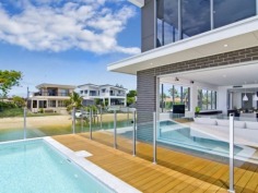 Large Family Home or Holiday Letters Dream!
This property has been architecturally designed with a beautiful outlook from the street and looking in from the water. This house has been solely built to be in a holiday letting pool and is currently forward booked for the next 11 months! 

The house offers a new level of contemporary design and living. It has an amazing open plan kitchen which includes a bar fridge and a butlers pantry. It boasts a massive living area that has views of the pool, canal and Broadbeach. This house is ideal for large groups and families with its 5 huge bedrooms and 4 bathrooms.The master bedroom has stunning views of Broadbeach and the waterways. Each bathroom presents elegance and design and you won't be disappointed.

Returning approximately $100,000+ per year!



This apartment is consistently booked and can be inspected between bookings only. Please contact Matt Conduit or Trent Macartney to organise your inspection.
 
Property Snapshot 

Property Type:HouseAspect Views:South East