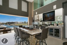 Modern contemporary elegance would best describe this stunning three-level home, perfectly positioned on the waterfront overlooking the wide open canal and out to the Broadwater. From the striking water feature in the entry, through to the incredible kitchen with backlit glass feature, this home provides the very best in indoor and outdoor luxury lifestyle. Whether you are after an impressive bar and entertaining area on the waterfront, or a huge man cave including 12 person spa, this is the house for you!

This home's features include:

-	6 bedrooms
-	5 bathrooms
-	3 powder rooms
-	10 car basement garage
-	North-to-water aspect
-	28 m* waterfrontage
-	Great floor plan with void creating abundance of light and space
-	Stone, marble and water features provide a warm ambience
-	Floor to ceiling glass bi-folds create the ultimate in seamless indoor/outdoor living
-	Sunken formal lounge with gas fireplace
-	Floor to ceiling glass creates spectacular frame for the sensational water views
-	Open plan living areas taking full advantage of the views
-	Fabulous kitchen with backlit glass feature, stone bench tops, wine fridge, Miele appliances including coffee machine
-	Stunning outdoor entertaining area with electronic shutters, stone benches, bar area, cold room, wine fridges, sink and BBQ - and a big screen TV!
-	Another open air entertaining terrace on the waterfront, next to the in ground heated lap pool with plunge pool
-	Tiered theatre with premier home theatre system, a bar and its own powder room
-	Impressive master suite on ground floor with stone feature wall above the vanities, enormous stand-alone bath
-	Master also boasts large walk-in robe with shoe and handbag display areas
-	Upstairs the 2 large waterfront bedrooms are ensuited with superb views
-	There are also 3 bedrooms built especially for the kids with built-in daybeds, which share a bathroom
-	Enviable 'man-cave' in basement, with sliding doors, plenty of room to create the perfect den for your needs
-	Just outside the den area is a 12-person spa
-	Also in basement you will find a dedicated gym room with TV and floor-to-ceiling mirrors, beauty room and bathroom
-	Schindler's lift to all levels
-	Polished timber floors upstairs
-	Floating pontoon with 15m* pontoon
-	Superb position in canal with views out to the open Broadwater
-	Fully fenced with secure gatehouse at front
-	Fully automated C-bus system
-	Reverse cycle ducted air conditioning

Located in a quiet cul-de-sac in a prestigious street surrounded by other waterfront mansions, you are in good company! The Sovereign Islands is a unique island community providing 24 hour security with patrols. Private, luxurious and secure, yet so close the cafes, restaurants, shops and parklands of Paradise Point.

Call Shaun today to arrange your private inspection.