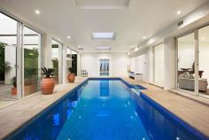 HAMPTON 28 Beach Road
EmailFacebookTwitterGoogle +Print this pageAdd to Favourite/BookmarkShare this site
Private Sale Contact Agent
4 B 3 b 4 C Watch property video
Unparalleled Resort Style Living on the Bay!
Enjoy a luxury beachside lifestyle with show-stopping bay views and timeless Jon Friedrich design with a focus on exceptional indoor/outdoor entertaining. Inspired by Noosa's Seahaven Resort this prestigious 3 bedroom, 3.5 bathroom residence boasts spectacular uninterrupted views stretching from Sandringham Yacht Club to Green point & beyond combined with sparkling internal pool views downstairs. Immaculately presented for family enjoyment featuring grand proportions and three flexible living zones including a ground floor kids haven or guest quarters with two double bedrooms both with mirrored robes & sleek granite vanity ensuites and a fully fitted study that provides a fourth bedroom option. Choose a dip in the Bay via direct access to one of Melbourne's best beaches or luxuriate by the tranquil indoor resort style lap pool encased in huge glass windows with sliding doors to a vast family lounge & bar on one side and a landscaped, paved outdoor area on the other. Panoramic views dominate the upstairs open plan living & dining area with an epicurean kitchen (granite bench tops & walk in pantry) and a sublime full-length outdoor terrace perfect for sunset entertaining. An elegant parents lounge with study alcove & a rear sun soaked deck (built in BBQ) precedes a lavish master suite with 'his & hers' dressing room and a grand Travertine spa ensuite. Meticulous attention to detail, superior finishes and luxury extras such as custom cabinetry throughout, a poolside shower, zoned heating/A/C, ducted vacuuming, alarm and a unique circular driveway with two internal access double garages (4 cars) only moments to Hampton Street shopping, dining & the station complete this idyllic family residence. For more information about this unsurpassed lifestyle property please contact Andrew Campbell.