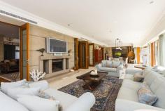 54 Lane Cove Road,  Ingleside NSW For Sale - Offers Over $8,500,000  8  9  6 Unequivocally one of Sydney's finest estates, this magnificent 5 acre holding has left nothing undone its quest for luxurious liveability. From its spectacular gala indoor/outdoor entertaining venues including a tennis court, 26 metre heated pool, indoor jumps arena and state-of-the-art stables, it exceeds the expectations of the most discerning elitist on every front. Nestled on private rolling lawns with sweeping 180 degree north easterly ocean and coastal vistas, it is only 30 minutes from the CBD and moments to village shops, schools and beaches. Drive through the secure gated entry and wind your way past the timber post, rail paddocks and cascading waterfall to the residence. From the moment you lay eyes on the exquisitely crafted facade it becomes immediately apparent that this residence is of the highest calibre. Exquisitely crafted from sandstone and wrapped in a timber posted bull-nose verandah with a large turret romancing the facade, it tastefully fuses Australian colonial and European provincial themes with designer finishes to create a retreat of elegance and sophistication with a warm country-style ambiance. Guests are welcomed through the grand formal entrance foyer with soaring double height ceilings with an elaborate antique chandelier lighting the way. The living spaces have been cleverly interwoven to integrate with an enormous indoor/outdoor loggia with an open fireplace. Separate living and dining areas merges seamlessly with level lawns and soaks in the north easterly sun, summer breezes and sweeping views. It comes complete with formal living and dining spaces plus an enormous family room or home cinema with surround sound and mounted flat screen TV.  Finished in imported Italian marble with a breakfast bar and state-of-the-art European appliances, the kitchen is equipped with a commercial-grade gas stove with barbecue plate and two ovens, two integrated dishwashers and pantry. King sized bedrooms all with built-ins and ensuites. The palatial master forms the heart of circular turret & features towering ceilings, dressing room, wardrobes built into the circular wall & a spiral staircase that leads to a circular mezzanine library with access to the sun drenched terrace with spectacular views.  Absolute heaven for the dedicated wine connoisseur, the wine cellar is locked behind iron gates and consists of a labyrinth of sandstone walled rooms with cedar wine racks holding up to 4,000 bottles. 