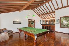  CARINGBAH SOUTH NSW 104 Telopea Avenue Privately nestled away from the street, this architecturally designed home offers exceptional amounts of entertainment space for the family to enjoy. Its tranquil 1163sqm block has superb proximity to shops, schools and a wealth of waterfront facilities. Combined lounge and dining displays soaring raked ceilings Billiards room finished with wet bar and parquetry flooring In-ground pool with integrated spa and a freestanding cabana Covered barbecue terrace overlooks a leafy paved backyard Modern eat-in kitchen plus a sleek renovated main bathroom Master bedroom with spa ensuite, all bedrooms with built-ins Flexible rumpus/fourth bedroom, cellar and ample storage Ducted air conditioning, skylights, double automated garage Large front drive, child-friendly grounds with a play area Five minute drive to Cronulla’s sparkling surf/bay beaches 