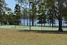 Bimbadeen means place of waterbirds - a waterfront acres sanctuary with 300 degree lake views, fishing, boating, sailing, flying??? Frontage to beautiful Lake Macdonald overlooking Noosa's botanical gardens. Private driveway is boarded by water on either side, with exotic wildlife and magnificent views to Mt Cooroy & Tinbeerwah. The perfect combination of being only 5 minutes from Cooroy and 15 minutes to Noosa, with town water, sewer and peace and tranquility. Sprawling brick residence with raked ceilings, french oak floors, gourmet kitchen, gas & induction cooking and ducted air conditioning. Solid timber doors & windows throughout. 3 separate living areas, wide entertaining patios, 4 car garage and boat store/cellar under the home.
500m Bitumen airstrip, fully insulated 2 plane hangar with workshop, separate machinery shed and van port.
Stroll the park like acreage on this resort style sanctuary tailored for relaxation. Host a tennis party on your own flood lit tennis court. This property is your opportunity to live the dream, own or operate an aircraft, also ideal for car or boat enthusiast with 2 large quality sheds and 3 phase power.18.29 acres/7.4 hectares. For further details or inspection please contact our office. rh06506

Bimbadeen - 18.29 acressealed airstrip2km Lake Frontplane hangar and shedstotally private