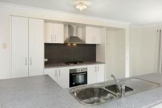 7 Freshwater Drive, Marshall VIC Private Sale   $389,000 - $419,000 4  B  2  b  2  C Brand New 4 BR + 2 Living Home - Not a Cent to Spend A perfect opportunity presents itself here for those wishing to reside within the popular Warralily Estate in Armstrong Creek without the challenge of having to build. Ideally located half way between Geelong and Barwon Heads this home represents a fantastic opportunity to capitalize on the enviable lifestyle and the huge investment potential that Geelong's first Master Planned community has to offer. Nestled comfortably on a landscaped, level allotment, this tasteful contemporary styled home has aesthetic appeal throughout. The nucleus of the home is the expansive open planned kitchen, dining and family area. Large island bench with stainless steel appliances and dishwasher will truly be the "hub of the home". You will love the expansive rumpus room at the rear of the home that will be perfect for movie nights or simply somewhere for you to kick off your shoes and relax. The master bedroom with walk-in in robe and generous ensuite and 3 further bedrooms all with BIRs are all of generous proportions. These bedrooms are well serviced by an appealing family bathroom. Inc. all window coverings, light fittings, ducted heating and cooling and double remote garage with direct access to the home. Move in and relax! With parks, bike and walking tracks within meters of this home and future schools and shops within easy walking distance an enviable opportunity awaits. Enjoy the best of both worlds, the city and the surf. http://www.7.freshwaterdrivearmstrongcreek.com/ 