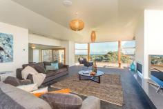 17 THE AVENUE VIC ID: 6981627 As far as the eye can see Perched high with PANORAMIC views of Bass Strait, Barwon Heads Bluff, Barwon River and beyond to the Otway’s, this stunning home offers luxurious family living by the seaside. Designed to take advantage of the views, capture the northern sun and provide extensive living and entertaining areas for family and many friends, the master crafted home sprawls across a unique double sized allotment (1190m2) in a very private pocket of town. Some of the many features include: -	5 bedrooms plus an office -	Ensuite, central bathroom plus two powder rooms -	Formal lounge with OFF opening to swimming pool (nth side) and extensive deck with commanding views (sth side) -	Fully appointed kitchen with WIP and adjoining dining area (views) and family room -	Upper level entertaining room with OFP (views), wet bar and viewing deck. -	Heating and cooling throughout -	Too many features to list An outstanding property offering a rare combination of luxury, space and PANORAMIC Water Views. Inspection by appointment only. Expressions of Interest Close Wednesday 21st May 12noon if not sold prior 