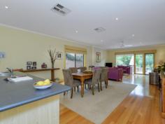  13A Kilara Road, Mentone Vic Blue Chip Mentone Escape to an oasis in the heart of Mentone's beach, school and park precinct. Custom designed for garden living and an easy life, this three bedroom, three bathroom area home stretches back into surprisingly deep gardens to offer expansive open-plan living/dining spilling out to lush Mediterranean-style gardens filled with olives, citrus trees and entertaining spaces including a built-in BBQ! Cleverly accommodating with two ensuite-access bedrooms plus a third designed to double as home-office or sitting-room, this enchanting home stars a spectacular balconied master domain featuring an elegant ensuite, dressing-room with tea-making facilities.... and room to retreat with a lush green neighbour-free outlook and a tip-toe bay-glimpse!  Centrally heated and cooled with an impressive open-fireplace and ducted vacuum system, this high-quality home features a prestige St George appliance kitchen, elegant bathroom area and generous storage including robes. Fronted by an auto-entry garage with gorgeous gardens behind, the park within steps and the bay, village and station within a walk, this is your lock-and-leave lifestyle option or sea-breeze sanctuary in the heart of it all. 