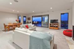  15 Hull Road MOUNT MARTHA $1,100,000 Plus Property ID: #2625371 The Best Of Both Worlds 4 2 2 Deliberately orientated to enjoy uninterrupted stunning northern bay views through to the city skyline, this immaculately kept home of 7 years will suit the busy family or couple who love to entertain. - A very practical floor plan rolls out the moment you step inside the inviting 'crazy stone' paved entrance hall - 4 generous bedrooms, the master (with full ensuite and walk in robe). You will love waking up to the sparkling blue bay - Upstairs there is a very generous kitchen complete with butler's pantry that adjoins the meals/family areas that form the hub of the home - Downstairs there is a huge rumpus/family room complete with wet bar that overlooks the wonderful landscaped garden that offers room for an in ground pool that would be positioned perfectly to enjoy the view - Two additional cleverly designed areas create a wonderful reading nook and gym zone. - Quality fittings throughout include gas ducted heating, ducted vacuum system, refrigerated cooling upstairs, Smeg appliances, gas log fire plus much more.  - Ample off street parking including room for a caravan/boat - Walking distance to Mount Martha Primary School via walking track from Shona Place and to the Village and beach A rare opportunity to enjoy the stunning bay and city lights whilst also being walking distance to all that marvellous Mount Martha has to offer.  Amanda Haimona RELAX..........YOU'RE HOME AT MT MARTHA Arguably one of the most beautiful coastal towns in the world, it's no wonder so many people are making Mt Martha their home. Whether you're looking for a sea change or a holiday home, you can relax - Mt Martha is without doubt one of the last true seaside havens offering an enviable lifestyle with something for everyone! Only 63 kms from Melbourne, Mt Martha is renowned for its pristine beaches, picturesque bay and rural views and a relaxed, warm community feel so often lacking in today's hectic society. Nestled at the gateway to the spectacular Mornington Peninsula, Mt Martha is the perfect stepping stone to some of the most stunning natural landscape you'll ever see. Dotted throughout the rolling hills and natural bushland you'll discover quality wineries, restaurants and world class golf courses to indulge your love of everything that's good in life! Although it's a place for all seasons, Mt Martha becomes a veritable summer playground in the warmer months; the sunny beaches come to life with people enjoying the beautiful bay in every way! Whether you're sailing, swimming, snorkelling or just laying back and soaking up the sun and the lifestyle - we're sure you'll agree - Mt Martha truly is paradise!   Inspection Times 1:00pm - 1:30pm Saturday, 17 May 2014 Land Size 1564 m 2 Features •Balcony•Built In Robes•Dishwasher•Ducted Heating•Ensuite•Fully Fenced•Gym•Open Spaces•Remote Garage•Rumpus Room 