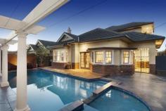 2 Stanley Street, Essendon VIC Family First And Foremost The balance between indoor brilliance and outdoor beauty is such a signature of 'MAGNOLIA', a landmark family property, perfectly positioned so that leading schools, several cafes and Essendon station are all only moments away. Remarkable privacy and landscaped front and rear gardens complement renovated spaces including elegant formal living and dining rooms and light filled family room/meals areas accompanied by a designer kitchen with dual ovens, two dish-washers, walk-in pantry and cellar. Four bedrooms, upstairs and downstairs bathrooms, a study, engaging retreat and balcony that sees the city add further appeal to a family home that's outstanding in every way. - Family proportions of incomparable quality - Ducted heating and five reverse cycle units- Wisteria covered pergola, solar heated pool - Secure 3 car garage, 16 000L water storage 