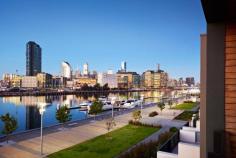 48 South Wharf Drive, Docklands VIC DOCKLANDS  48 South Wharf Drive FOR SALE  Stunning Water Front Home, Own Your Own Land! In a class of its own, updated and adapted to provide genuine, generous family spaces in one of Melbourne's most desirable settings. Absolute Yarra frontage and spectacular views complement elite dimensions, designed to deliver ultimate allure. Large living and dining areas surround the perfect example of the outdoor room, a central courtyard featuring automatic canopy and fully plumbed BBQ kitchen. Inside, this refined residence's principal kitchen features stone benches, pantry storage and the full suite of Miele appliances. Four upstairs bedrooms and two bathrooms include a main bedroom with walk-in robes, spa ensuite and a decked retreat overlooking the river. The effect is unforgettable. Lift access to all levels, basement sauna, flexible cinema and four car garage are amongst the landmark home's additional advantages. Impossible to resist.   