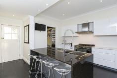 38 Curzon Road, New Lambton NSW Land Size1088 Square Mtr approx. Inspections  Sun 4 May 11:00am - 11:30am This beautiful weatherboard home presents as a private haven of contemporary style, comfort and convenience. Gorgeously renovated throughout with taste and flair, its crafted for the demands of modern living incorporating a lower level retreat and inviting alfresco entertaining. A picturesque 1088sqm north-facing parcel, it rests in a community-minded enclave perfect for families, busy executives, hospital staff or downsizers. The home opens to reveal distinct living and dining spaces that beautifully blend period ornate ceilings, polished timber floors and picture rails with a contemporary gas fireplace, plantation shutters and a fresh colour scheme. Outdoor flow to a sunny front deck provides the perfect spot for alfresco entertaining. The sleek kitchen is ideal for the home entertainer fitted with high quality appliances, stone tops and a butler's pantry. Three bedrooms and a chic family bathroom are also located on this level. The huge master bedroom boasts a walk-in robe and ensuite with marble vanity. Downstairs delivers a versatile extra living space/teenager's retreat. It boasts a storage area, air-conditioning, bespoke cabinetry and its own separate entry providing options for buyers seeking space to work from home. Additional features include a double carport, ample driveway parking, ducted air-conditioning, surround sound and security system. This blue ribbon address is just a stroll to New Lambton's popular cafe and shopping strip, sought-after schools and the John Hunter Hospital. - Beautifully renovated weatherboard home on private 1088sqm parcel - Distinct living and dining spaces with contemporary gas fireplace - Sleek stone kitchen featuring six-burner gas cooker and clever storage options - Three upper level bedrooms including master with walk-in robe and ensuite - Versatile lower level retreat with air-conditioning, custom desks and storage - North facing block featuring private alfresco entertaining deck - Heated floors and towel rails to both bathrooms - Stroll to New Lambton village shops, cafes and sought-after school - Close to John Hunter Hospital and University of Newcastle Contact your selling agent George Rafty. What does Preview mean? When PRDnationwide properties are listed for "Preview" it generally means that have just been listed and you are amongst the first buyers in the market to be exposed to the property. The vendors may not have formally set a price guide for the property at this stage as they may wish to gain further feedback from the market before doing so. Often they are gaining further feedback from the market to ensure they are being realistic with their price guide to enhance the chance of a swift sale when they go to the full Public Media Launch What is the price guide? Your friendly PRDnationwide agent will generally be able to provide you with a rough price guide for the property during the preview stage of marketing and can always update you on the formal price guide once it is ready to be published if it is substantially different from the Preview guide. If you have received an e-brochure about this property as part of PRD's Red Alert system, it is likely to be in the price range you have previously specified to us. Can I buy a property during the Preview stage of marketing? Absolutely! In fact up to 20% of PRDnationwide's properties sell in the Preview stage of marketing, often to the exclusive members of the PRD Red Alert buyer database.(register at www.prdnewcastle.com.au/red-alert? ) To give the best chance of securing a property before it makes it to the full Public Media Launch it is advised to offer towards the upper end of the pricing guide you have been given. For a quick video informing buyers and sellers what PRDnationwide Previews are all about click here - http://tinyurl.com/cjelafr 
