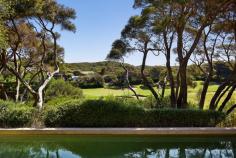  PORTSEA  4 Meredith Place FOR SALE  "ELOUNDA" With views over the Portsea Golf course, this architect designed home, framed by established Moonah trees offers a lifestyle of tranquillity and luxury. Tastefully decorated with 4 bedrooms, including master upstairs. The open plan kitchen, lounge, dining open to a large entertaining deck overlooking the golf course and pool. Features include heating, cooling and double garage. This is a wonderful property and will suit the most discerning of buyers. Land 1800 m2 (approx.)   