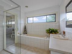  13A Kilara Road, Mentone Vic Blue Chip Mentone Escape to an oasis in the heart of Mentone's beach, school and park precinct. Custom designed for garden living and an easy life, this three bedroom, three bathroom area home stretches back into surprisingly deep gardens to offer expansive open-plan living/dining spilling out to lush Mediterranean-style gardens filled with olives, citrus trees and entertaining spaces including a built-in BBQ! Cleverly accommodating with two ensuite-access bedrooms plus a third designed to double as home-office or sitting-room, this enchanting home stars a spectacular balconied master domain featuring an elegant ensuite, dressing-room with tea-making facilities.... and room to retreat with a lush green neighbour-free outlook and a tip-toe bay-glimpse!  Centrally heated and cooled with an impressive open-fireplace and ducted vacuum system, this high-quality home features a prestige St George appliance kitchen, elegant bathroom area and generous storage including robes. Fronted by an auto-entry garage with gorgeous gardens behind, the park within steps and the bay, village and station within a walk, this is your lock-and-leave lifestyle option or sea-breeze sanctuary in the heart of it all. 
