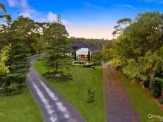 Glenhaven NSWResort Style Living on Acreage A masterpiece of contemporary design is this luxurious property set on 6 acres (approx.) in one of Hills Districts' sought after prime position. The stunning architecture of this home blends beautifully with the natural bushland setting. With approximately 5 arable acres, this home offers the best of both worlds, perfect sanctuary away from the hustle & bustle whilst having the convenience of being within a short drive from Castle Towers Shopping Centre, local schools, medical centres and transport.  Featuring high ceilings throughout and a light filled floor plan you'll enjoy the pool and garden views from every corner of this spectacular home. With everything a family can wish for and more, you will be spoilt for choice!  * Gorgeous driveway with automatic gates leading to the front porch overlooking the koi pond  * Impressive entrance through the double doors leading to the formal and informal areas  * Stunning high quality kitchen with stone bench tops, large walk-in pantry, dishwasher, built-in double oven plus coffee machine, water filter and more  * Casual dining and living areas off kitchen overlooking the pool with bushland view  * Formal dining room opening onto private paved terrace  * Master bedroom suite with walk-in robe, additional cupboards and ensuite with his & hers vanity  * Additional 4 double sized bedrooms each with walk-in wardrobes and ensuite to 3  * Study room/home office fitted with built-in storage and wash closet  * Loft style staircase leading to the separate large attic - ideal for man cave or kids hideout  * Sprawling poolside alfresco and BBQ area with gas outlets  * Wet bar adjoining main entertaining areas  * Lavish sun-drenched 25m inground swimming pool and spa equipped with solar heating  * 2 underground water tanks  * Championship sized tennis court - Hold your own grand slam!  Additional lifestyle features include ducted air conditioning throughout, natural gas outlets, alarm system, video security system, polished hardwood floors, floor heating and four car garage with automatic doors. A rare opportunity to live an enviable lifestyle so close to all amenities yet giving you the space and privacy of acreage property!  The photos and description cannot replace the experience of a walk through inspection.  To arrange for a private viewing call Ruma Mundi on 02 8883 1088 or 0411 030 202. 