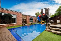 26 Riversdale Drive, Werribee VIC Property Features House 5   3   3   4     Formal Lounge Separate Dining Balcony Air Conditioning Built-In Wardrobes Close To Schools Close To Shops Close To Transport Garden Secure Parking Pool 2x Study Ducted Heating Ducted Cooling Description - Built up to a standard, not down to a price and offering endless indoor/outdoor entertaining and accommodation options. - Five bedrooms, all with walk in-robes and ceiling fans, two bedrooms with ensuites. - Main bedroom with hotel inspired luxury ensuite and opening to balcony offering views across parks the Werribee River and the You Yangs. - Fully equipped home theater delivering your own gold class experience for friends and family. - Formal living, expansive casual living, home theatre and study on the lower level complementing retreat/gym/study opening to balcony on the second level. - Masterchef kitchen showcasing stone benches, stainless steel equipment, huge walk in pantry and plumbed fridge cavity. - Casual living flowing seamlessly to decked alfresco with mains gas BBQ. Overlooking stunning rock water feature, spa and sparkling pool with water slide; they deliver the best in indoor-outdoor entertainment. - 930 m2 allotment (approx) with landscaped rear yard featuring low maintenance astro turf, in ground trampoline, basketball ring and dedicated play area for kids of all ages - Walk in store room, fitted laundry with warming cabinets and laundry chute. Double remote garage with internal access and separate side access to 4x8 meter powered shed. - Zoned ducted heating,ducted cooling and double glazed windows for year round comfort, CCTV with Foxtel to all TV's - Other features include easy care polished concrete floors complementing quality carpets throughout. - Desired inclusions of drip system, zoned ducted vacuum, alarm, outdoor shower by the pool with outdoor toilet - A Paradise For Entertainers And A Haven For Relaxed Family Living. 