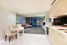 301/576 St Kilda Road, MELBOURNE, VIC Oversized Designer apartment << Previous     Next Property >> Larger than most two bedroom apartments and a rare example of uncompromised quality and design more akin to a private luxury resort. This stunning oversized one bedroom residence positioned securely on the 3rd level is beautifully appointed with the highest quality fixtures and fittings throughout. Comprises of expansive open plan living / dining leading onto an entertainer's balcony, sleek modern kitchen with the finest quality Smeg appliances, bronze mirror splashback and stone benchtops, integrated fridge and microwave oven, and smartly concealed euro laundry. The main king size bedroom includes WIRs and floor to ceiling windows with a surprising and spectacular central bathroom featuring glass mosaic tiles, free-standing designer bath and separate shower. There is a secure basement car park and a storage cage. Beautifully located on stunning tree-lined St Kilda Road with public transport at your doorstep and direct access to the CBD, a short stroll to Albert Park Lake, iconic Fawkner Park, Chapel Street cafs, restaurants and shopping. Other features include; 24 hour concierge, secure intercom entry, ducted heating/cooling, lift access and is pet friendly. Facilities: fully equipped 5 star gym, indoor-heated pool, spa, steam room, cinema room, business centre, executive lounge, visitors parking. 