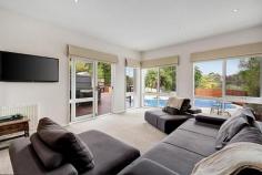 Property ID: 2626905442 1EXCEPTIONAL ENTERTAINER, PARAMOUNT POSITION101a The Eyrie, EAGLEMONTLand Size 1293 m2 approx.Floorplan  View Floorplan A spectacular lifestyle oasis boasting heated pool/spa, Mod-grass tennis court and sweeping views, this exceptional residence on a wide and deep 1293m2 allotment (approx) stands tall in the upper reaches of one of Eaglemont's most coveted positions. A unique multi-level design enhanced by a stylishly evolved interior delivers remarkable contemporary living in a sublime setting tailored for unrivalled indoor-outdoor enjoyment near private schools, village cafes, parkland, hospitals and train station. Features four bedrooms (BIRs, study annexe, main with custom-built BIRs and ensuite), executive study, four bathrooms, sumptuous dining area, family living room, gourmet granite kitchen with Smeg/Miele appliances, laundry chute, subfloor cellar, hydronic heating, alarm, rich timber floors, balconies, extensive entertainment deck, rainwater tank and ROW. Miles Real Estate.  