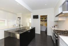 38 Curzon Road, New Lambton NSW Land Size1088 Square Mtr approx. Inspections  Sun 4 May 11:00am - 11:30am This beautiful weatherboard home presents as a private haven of contemporary style, comfort and convenience. Gorgeously renovated throughout with taste and flair, its crafted for the demands of modern living incorporating a lower level retreat and inviting alfresco entertaining. A picturesque 1088sqm north-facing parcel, it rests in a community-minded enclave perfect for families, busy executives, hospital staff or downsizers. The home opens to reveal distinct living and dining spaces that beautifully blend period ornate ceilings, polished timber floors and picture rails with a contemporary gas fireplace, plantation shutters and a fresh colour scheme. Outdoor flow to a sunny front deck provides the perfect spot for alfresco entertaining. The sleek kitchen is ideal for the home entertainer fitted with high quality appliances, stone tops and a butler's pantry. Three bedrooms and a chic family bathroom are also located on this level. The huge master bedroom boasts a walk-in robe and ensuite with marble vanity. Downstairs delivers a versatile extra living space/teenager's retreat. It boasts a storage area, air-conditioning, bespoke cabinetry and its own separate entry providing options for buyers seeking space to work from home. Additional features include a double carport, ample driveway parking, ducted air-conditioning, surround sound and security system. This blue ribbon address is just a stroll to New Lambton's popular cafe and shopping strip, sought-after schools and the John Hunter Hospital. - Beautifully renovated weatherboard home on private 1088sqm parcel - Distinct living and dining spaces with contemporary gas fireplace - Sleek stone kitchen featuring six-burner gas cooker and clever storage options - Three upper level bedrooms including master with walk-in robe and ensuite - Versatile lower level retreat with air-conditioning, custom desks and storage - North facing block featuring private alfresco entertaining deck - Heated floors and towel rails to both bathrooms - Stroll to New Lambton village shops, cafes and sought-after school - Close to John Hunter Hospital and University of Newcastle Contact your selling agent George Rafty. What does Preview mean? When PRDnationwide properties are listed for "Preview" it generally means that have just been listed and you are amongst the first buyers in the market to be exposed to the property. The vendors may not have formally set a price guide for the property at this stage as they may wish to gain further feedback from the market before doing so. Often they are gaining further feedback from the market to ensure they are being realistic with their price guide to enhance the chance of a swift sale when they go to the full Public Media Launch What is the price guide? Your friendly PRDnationwide agent will generally be able to provide you with a rough price guide for the property during the preview stage of marketing and can always update you on the formal price guide once it is ready to be published if it is substantially different from the Preview guide. If you have received an e-brochure about this property as part of PRD's Red Alert system, it is likely to be in the price range you have previously specified to us. Can I buy a property during the Preview stage of marketing? Absolutely! In fact up to 20% of PRDnationwide's properties sell in the Preview stage of marketing, often to the exclusive members of the PRD Red Alert buyer database.(register at www.prdnewcastle.com.au/red-alert? ) To give the best chance of securing a property before it makes it to the full Public Media Launch it is advised to offer towards the upper end of the pricing guide you have been given. For a quick video informing buyers and sellers what PRDnationwide Previews are all about click here - http://tinyurl.com/cjelafr 