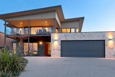  15 Hull Road MOUNT MARTHA $1,100,000 Plus Property ID: #2625371 The Best Of Both Worlds 4 2 2 Deliberately orientated to enjoy uninterrupted stunning northern bay views through to the city skyline, this immaculately kept home of 7 years will suit the busy family or couple who love to entertain. - A very practical floor plan rolls out the moment you step inside the inviting 'crazy stone' paved entrance hall - 4 generous bedrooms, the master (with full ensuite and walk in robe). You will love waking up to the sparkling blue bay - Upstairs there is a very generous kitchen complete with butler's pantry that adjoins the meals/family areas that form the hub of the home - Downstairs there is a huge rumpus/family room complete with wet bar that overlooks the wonderful landscaped garden that offers room for an in ground pool that would be positioned perfectly to enjoy the view - Two additional cleverly designed areas create a wonderful reading nook and gym zone. - Quality fittings throughout include gas ducted heating, ducted vacuum system, refrigerated cooling upstairs, Smeg appliances, gas log fire plus much more.  - Ample off street parking including room for a caravan/boat - Walking distance to Mount Martha Primary School via walking track from Shona Place and to the Village and beach A rare opportunity to enjoy the stunning bay and city lights whilst also being walking distance to all that marvellous Mount Martha has to offer.  Amanda Haimona RELAX..........YOU'RE HOME AT MT MARTHA Arguably one of the most beautiful coastal towns in the world, it's no wonder so many people are making Mt Martha their home. Whether you're looking for a sea change or a holiday home, you can relax - Mt Martha is without doubt one of the last true seaside havens offering an enviable lifestyle with something for everyone! Only 63 kms from Melbourne, Mt Martha is renowned for its pristine beaches, picturesque bay and rural views and a relaxed, warm community feel so often lacking in today's hectic society. Nestled at the gateway to the spectacular Mornington Peninsula, Mt Martha is the perfect stepping stone to some of the most stunning natural landscape you'll ever see. Dotted throughout the rolling hills and natural bushland you'll discover quality wineries, restaurants and world class golf courses to indulge your love of everything that's good in life! Although it's a place for all seasons, Mt Martha becomes a veritable summer playground in the warmer months; the sunny beaches come to life with people enjoying the beautiful bay in every way! Whether you're sailing, swimming, snorkelling or just laying back and soaking up the sun and the lifestyle - we're sure you'll agree - Mt Martha truly is paradise!   Inspection Times 1:00pm - 1:30pm Saturday, 17 May 2014 Land Size 1564 m 2 Features •Balcony•Built In Robes•Dishwasher•Ducted Heating•Ensuite•Fully Fenced•Gym•Open Spaces•Remote Garage•Rumpus Room 
