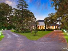 Glenhaven NSWResort Style Living on Acreage A masterpiece of contemporary design is this luxurious property set on 6 acres (approx.) in one of Hills Districts' sought after prime position. The stunning architecture of this home blends beautifully with the natural bushland setting. With approximately 5 arable acres, this home offers the best of both worlds, perfect sanctuary away from the hustle & bustle whilst having the convenience of being within a short drive from Castle Towers Shopping Centre, local schools, medical centres and transport.  Featuring high ceilings throughout and a light filled floor plan you'll enjoy the pool and garden views from every corner of this spectacular home. With everything a family can wish for and more, you will be spoilt for choice!  * Gorgeous driveway with automatic gates leading to the front porch overlooking the koi pond  * Impressive entrance through the double doors leading to the formal and informal areas  * Stunning high quality kitchen with stone bench tops, large walk-in pantry, dishwasher, built-in double oven plus coffee machine, water filter and more  * Casual dining and living areas off kitchen overlooking the pool with bushland view  * Formal dining room opening onto private paved terrace  * Master bedroom suite with walk-in robe, additional cupboards and ensuite with his & hers vanity  * Additional 4 double sized bedrooms each with walk-in wardrobes and ensuite to 3  * Study room/home office fitted with built-in storage and wash closet  * Loft style staircase leading to the separate large attic - ideal for man cave or kids hideout  * Sprawling poolside alfresco and BBQ area with gas outlets  * Wet bar adjoining main entertaining areas  * Lavish sun-drenched 25m inground swimming pool and spa equipped with solar heating  * 2 underground water tanks  * Championship sized tennis court - Hold your own grand slam!  Additional lifestyle features include ducted air conditioning throughout, natural gas outlets, alarm system, video security system, polished hardwood floors, floor heating and four car garage with automatic doors. A rare opportunity to live an enviable lifestyle so close to all amenities yet giving you the space and privacy of acreage property!  The photos and description cannot replace the experience of a walk through inspection.  To arrange for a private viewing call Ruma Mundi on 02 8883 1088 or 0411 030 202. 