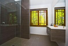 19 Burwood Road, Whitebridge NSW Land Size9996 Square Mtr approx. If you've been dreaming of a small acreage that's close to the CBD and the beaches, then your dream may have just come true. This truly unique family home sits on 10,000 square metres of land, less than 800m from the entrance to Dudley beach in one of the regions most prestigious street locations. Formerly a family home and dental laboratory, this property has recently undergone massive renovations to restore the home itself and convert the laboratory to a beautiful self contained apartment. Just imagine a home of these proportions that could accommodate your loved ones in comfort and privacy for many years to come. The home is privately set back from the road, without an imposing front fence to create a welcoming feel. Down the driveway and past the beautiful, but natural looking landscaping, you will find a large parking and turning area, as well as access to the triple car garage. Upon entry via the front stairs and verandah, you are greeted inside by tall ceilings, rich timber flooring and a sense of individual decorating that just seems to work with the surroundings. There is a large formal lounge and sitting area at the front of the home, feast for chatting with guests and relaxing. Also at the front of the home is a massive formal dining area, large enough for a twelve seat table. Here you will find beautiful chandeliers overhanging. The ceilings soar toward the rear of the home, over a casual sitting area adjacent to the kitchen. The kitchen has such a warm and inviting feel and features old style stove with modern controls, central island bench with integrated dishwasher, an abundance of storage and a fantastic dining area, similar to what you would find in a traditional restaurant. A great place to eat breakfast with the family. The view from the recently restored rear entertaining deck is just delightful. It overlooks the grassy and private rear yard that has a parkland style feel. It features hardwood timber construction and is just a beautiful place to soak up the rural atmosphere that this location encompasses. The accommodation in the home is abundant to say the least. Down the hall to the north of the home there are three massive bedrooms and the master suite. The main bathroom that services the bedrooms features a gorgeous stand - alone bath and classic tap ware. The master suite is the size of two standard double rooms and has its own access to a private sitting area in the northern sun and a private spa to relax in. There is another large bedroom and bathroom upstairs on the mezzanine level. On this level there is an abundance of storage space, an additional two living spaces and several little sitting areas where you can read a book in the morning sun flowing in the front of the home from the eastern windows. One of the living spaces is the ideal kids retreat, with a television or gaming area that is out of sight, out of mind. In most cases, this amount of accommodation alone would suit most families, though this is not like most homes... The freshly renovated apartment has both internal and private access. It comprises of a large bedroom, living space, bathroom, kitchen and laundry. It would be perfect for older generations, being all on one level, or young adults still living at home that require their independence. Some may even consider the passive income potential of this bonus offering. There is yet another potential office space on the mezzanine above the spacious garage as well. If what you read here appeals, then an inspection is highly recommended, because what is on offer is beyond the scope of this description. FRIENDLY AUCTION SYSTEM Pest and building inspection reports available prior to auction  
