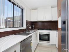 2/14-16 Ramona Street, Quakers Hill NSW Modern Townhouse - Walk to Station Offering a broad range of appeal for investors and first home buyers, Century 21 North Western is proud to market this 2 year old (approx.) modern townhouse situated in a small well maintained complex. Located just a stones throw from the station, it is also a short walk from local shops, child care centres and schools. You will be impressed by the list of lifestyle features on offer:  * Open plan lounge & dining room  * Kitchen with stainless steel appliances including dishwasher and gas cook-top  * Guest toilet downstairs  * Mirrored built-in robes to all 4 bedrooms  * Ensuite to master bedroom  * Well-appointed main bathroom  * Ducted air conditioning throughout  * Alarm, audio/visual intercom and more  * Tiles downstairs and to wet areas; Carpet upstairs  * Tandem lock-up garage with internal & drive through access  * Family friendly complex including a kids play area  Many other features but only one chance. Seize the opportunity!  Call our sales team for more details and inspection times. 