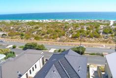  Scarborough WA Last Lot in a very unique beachside location directly over the road is the beach accessed on Brighton Beach Track #3 which is literally 50m from your home. Plans available (Lapsed DA) fully documented or an offer from the owner who is an architect for free design advice and Schematics. Ocean views will not be built out from this lot. Plans available or design your own home. A 395 sqm lot in an exclusive enclave of new, neat, highly specified homes. This lot is clear and ready to build your dream upon with dual street frontages allowing an option to garage locations. Walk through the winding track as it meanders around picturesque and untouched dune systems brimming with unique flora and fauna until you emerge at what is perhaps the most quiet and reclusive stretch of beachfront on the entire Perth Coastline.  To have such a desolate stretch of back beach this close to the centre of Perth City is truly quite amazing. Even during a summer heat wave, when you can see the bikini clad throngs in the distance at Scarborough beach to the north and the action packed City Beach dog beach to the south, you would be lucky to share the waters at the end of Track 3 with one or two other people, and on most occasions there is not another soul around. 
