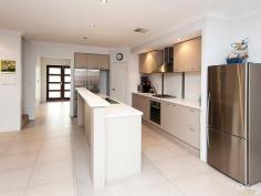 17 Chertley Street, Morley WA Home Open this Sun (15th) 2:00 to 2:30pm Inspection Times: Sun 15/06/2014 02:00 PM to 02:30 PM STROLL UP THE STREET TO WELD SQUARE PRIMARY SCHOOL  Just like new 4 bedroom, 2 bathroom, 2 storey home on easy care block with big back yard.  Entry via private courtyard into foyer where modern floor tiles flow past separate home theatre and shoppers entry from garage to generous open planned kitchen, dining, family rooms which looks onto koi pond in alfresco area.  Synthetic lawn in big, private yard with huge all-purpose lock up, pitched roof, Colourbond work shed / gym or games room.  Parents will love the upstairs retreat living with balcony and master bedroom with built in robes, en-suite & powder room and a further 3 double sized bedrooms downstairs in own wing.  FEATURES  DOWNSTAIRS  *	Security system  *	Ducted reverse cycle air conditioning throughout  *	High ceiling  UPSTAIRS  *	Parents retreat living area  EXTERNAL  *	Double lock up garage  *	Space to park 4 cars off road  