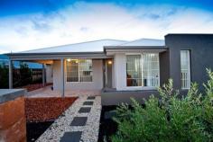 4 Rennex Ramble, Ellenbrook WA Looking for a FAMILY home in a fantastic area of Ellenbrook. This 2009 built home has great space with room to move and entertain. Featuring 4 bedrooms with built-in-robes and two bathrooms on a great sized low maintenance 540 sqm block. Part of the Malvern Springs Village, this eco friendly area is perfect for a family or those wanting a quiet home to lock and leave. Currently tenanted at $940pf, this elevated family home has plenty to offer, including; LARGE Master bedroom with walk in robe and ensuite. 3 good sized bedrooms with built in robes. Family room is ideal as separate space, or for use it as a games room or home theatre room. Open plan kitchen, meals and living space. Kitchen has gas cooktop, electric oven and lots of cupboard space for easy preparation of meals. A breakfast bar round off the kitchen as the heart of the home. The covered alfresco flows from meals area and is ideal entertaining space all year round. Double lock up car port with laneway access. Other features include timber flooring, gas storage hot water system, big back yard to run around in, views to the Hills, low maintenance gardens, close to schools, parklands and shopping precinct. Approx 3 km to The Vines Golf and Country Club; Approx 600m to Malvern Springs Primary School.   