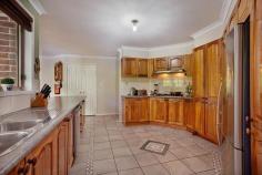  6 Bayldon Place, Glenmore Park NSW This immaculate five bedroom home is located in a stunning cul-de-sac and comprises a selection of formal living and casual living areas including separate rumpus room. Entertaining is easy with the large undercover area and sunken above ground swimming pool with enough grassed area left for the kids to play. -Spacious timber kitchen with gas cooking and large pantry  -Family room off the kitchen leading to a separate rumpus room  -Split system air conditioning  -Main bathroom with corner spa bath -Great sized bedrooms with ensuite and walk in robe to master bedroom  -Formal lounge and dining  -Side access could accommo 