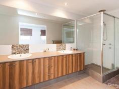 17 Chertley Street, Morley WA Home Open this Sun (15th) 2:00 to 2:30pm Inspection Times: Sun 15/06/2014 02:00 PM to 02:30 PM STROLL UP THE STREET TO WELD SQUARE PRIMARY SCHOOL  Just like new 4 bedroom, 2 bathroom, 2 storey home on easy care block with big back yard.  Entry via private courtyard into foyer where modern floor tiles flow past separate home theatre and shoppers entry from garage to generous open planned kitchen, dining, family rooms which looks onto koi pond in alfresco area.  Synthetic lawn in big, private yard with huge all-purpose lock up, pitched roof, Colourbond work shed / gym or games room.  Parents will love the upstairs retreat living with balcony and master bedroom with built in robes, en-suite & powder room and a further 3 double sized bedrooms downstairs in own wing.  FEATURES  DOWNSTAIRS  *	Security system  *	Ducted reverse cycle air conditioning throughout  *	High ceiling  UPSTAIRS  *	Parents retreat living area  EXTERNAL  *	Double lock up garage  *	Space to park 4 cars off road  
