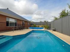 22 Gecko Road, Baldivis WA This beautifully designed 5 bedroom, 2 bathroom, plus study home has more than enough space for the entire family!  Downstairs there is a huge, gourmet kitchen complete with stone bench tops, that overlooks a spacious living room and alfresco area with a timber lined ceiling. The master bedroom is king sized and featured an ensuite with a luxurious spa bath, making it the perfect place to relax! Upstairs features a massive theatre room with projector screen and a balcony overlooking lush, green parklands.  Outdoors you will love the sparkling below ground pool, overlooked by the spacious alfresco area, which is an ideal place for entertaining.  Other features include: - Triple garage - Temperature controlled hot water system - Ducted reverse cycle air conditioning - Built-in robe to bedrooms - High ceilings - Spacious yard maintained by reticulation Offering a massive 350sqm of living space on a generous 745sqm block close to schools, shops, public transport and parks, this home would be ideal for any growing family!  Call Paul Sellen 0409 998 773 to arrange a private inspection today!   